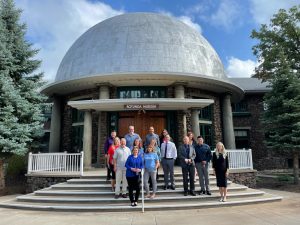 UWNA Board of Directors poses in front of Rotunda Museum at Lowell Observatory