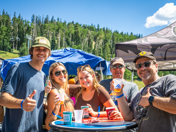 People enjoying themselves outside of Agassiz Lodge for Brews & Views event